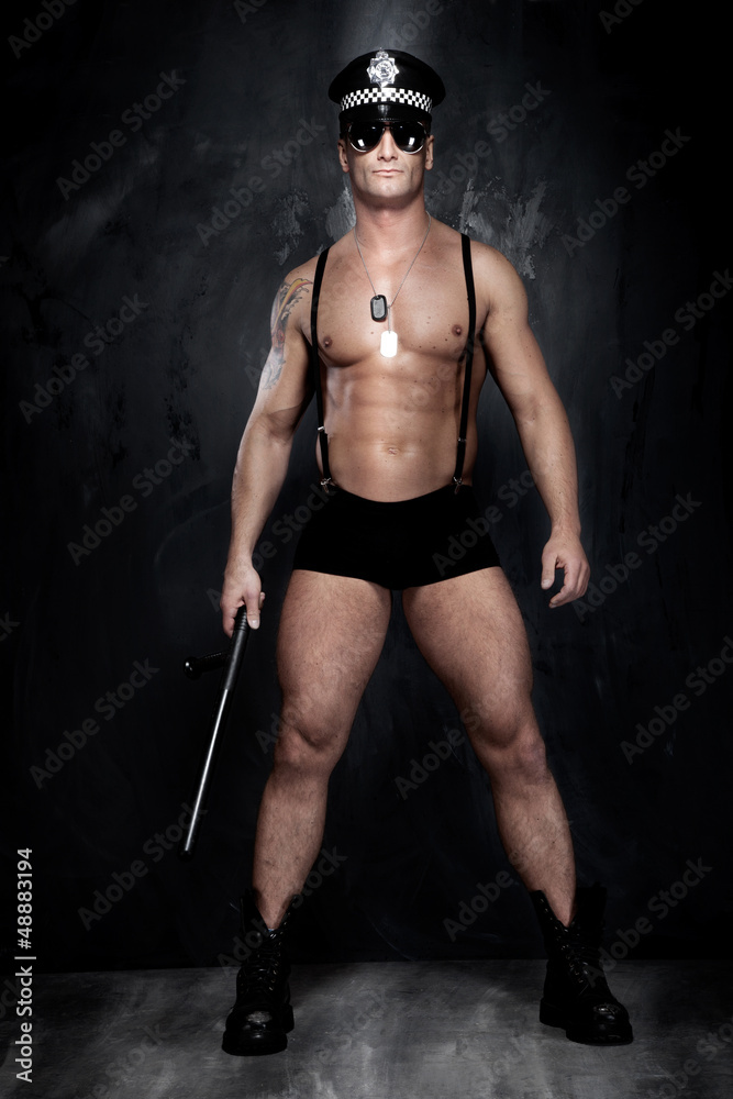 Conceptual photo of muscular, good looking police officer over t