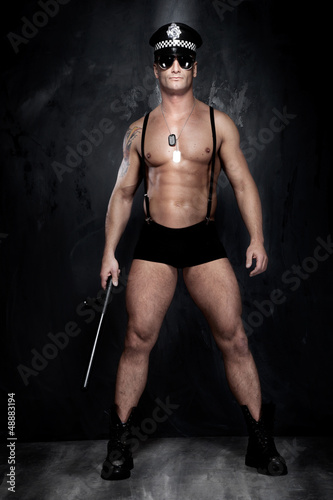Obraz na płótnie Conceptual photo of muscular, good looking police officer over t w salonie