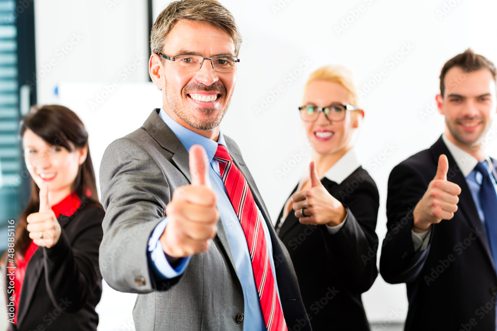 Business - group of businesspeople in office Business - group of businesspeople in office