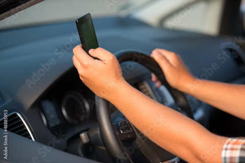 Texting and talking while driving © victorpr