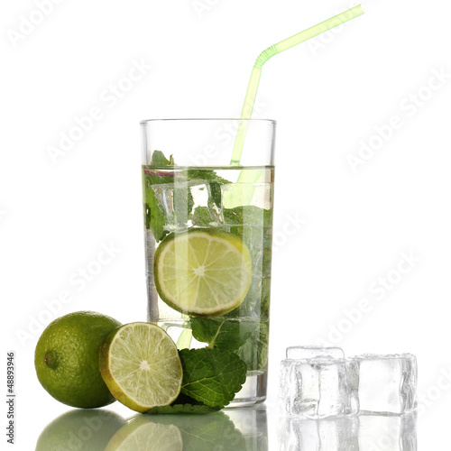 Glass of water with ice, mint and lime isolated on white