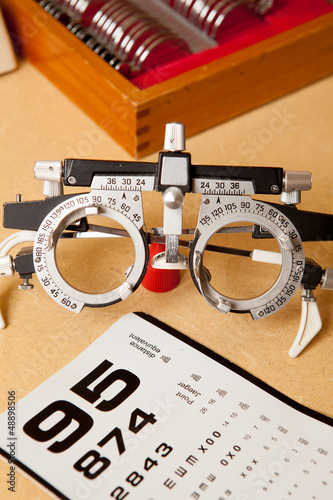 Eye exam glasses and chart