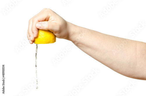 Hand squeezing lemon