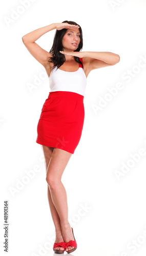 Portrait of sexy brunette in red white dress isolated © Voyagerix