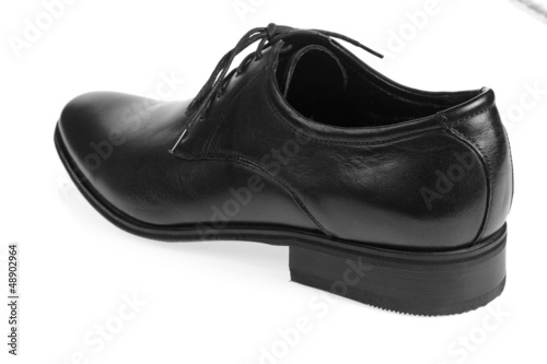 Single black man's shoe