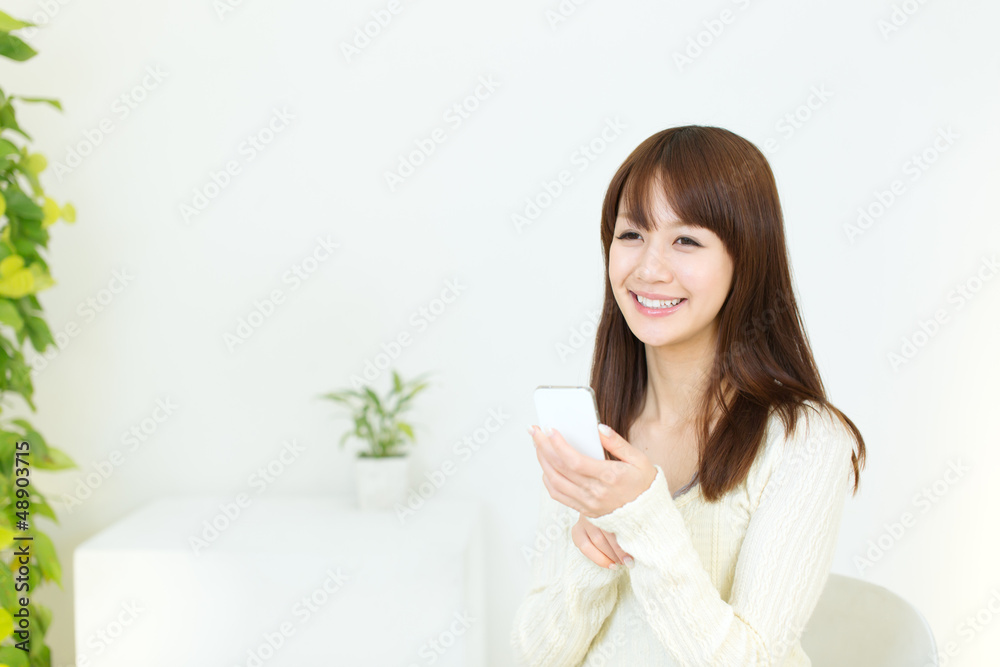 Beautiful young woman using a cellular Beautiful young woman using a cellular