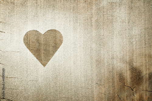 Heart pattern on an old wooden board