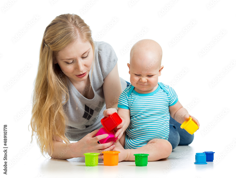 baby boy and mother playing together with cup toys baby boy and mother playing together with cup toys