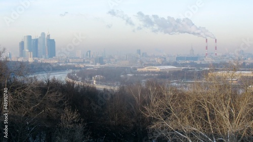 Business center Moscow City stands against city landscape photo