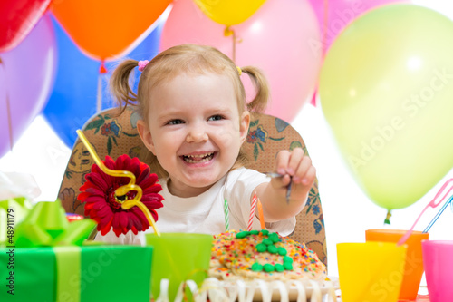 happy child girl on birthday party