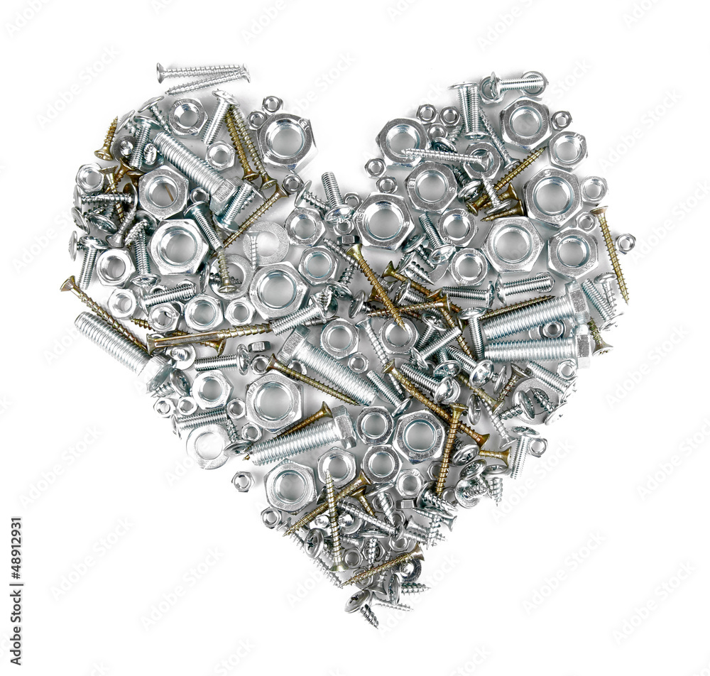 Assorted nuts, screws and bolts heart isolated on white Assorted nuts, screws and bolts heart isolated on white