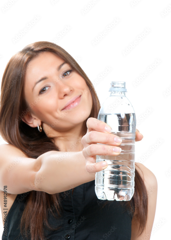 Woman showing or giving bottle of pure still drinking water Woman showing or giving bottle of pure still drinking water