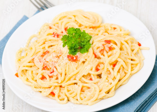 pasta with cream sauce and paprika