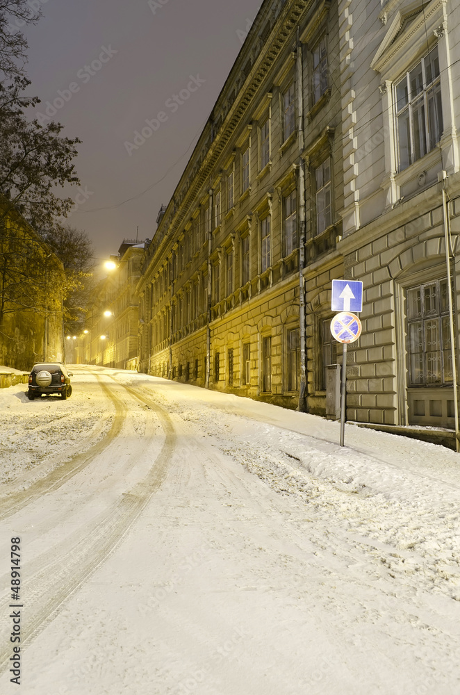 Beautiful winter cityscape at the night - old street in Lvov