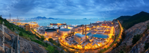 Gas storage spheres tank in petrochemical plant in sunset