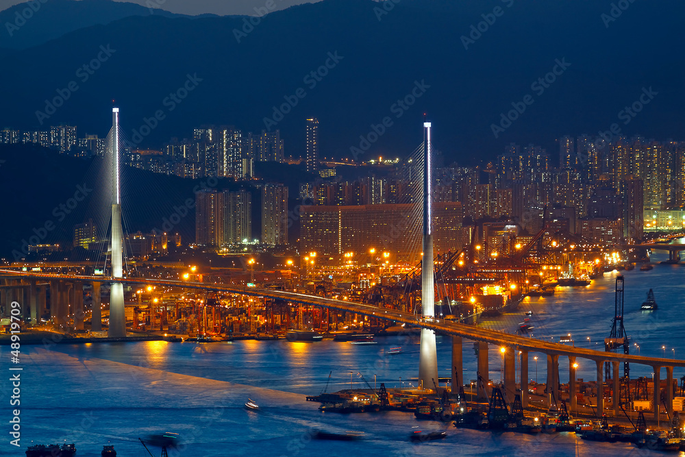 Fototapeta premium Freeway in night with cars light in modern city