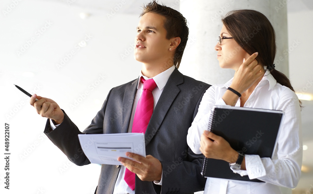 A couple of young businesswomen in formal clothes A couple of young businesswomen in formal clothes