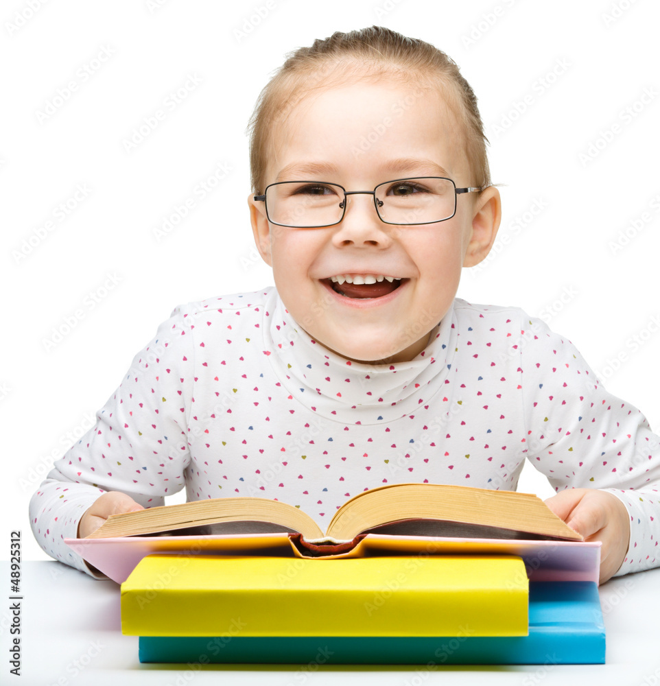 Little girl is reading a book Little girl is reading a book