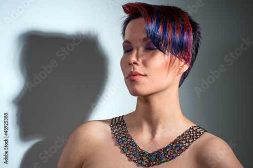 portrait of a beautiful girl with dyed hair, professional hair c photo