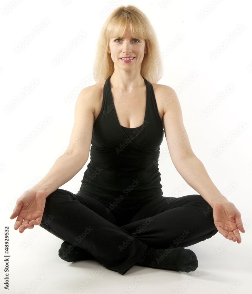 Woman doing yoga stretching exercise Woman doing yoga stretching exercise