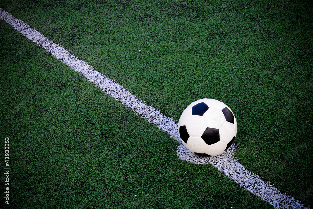 soccer ball on green field soccer ball on green field