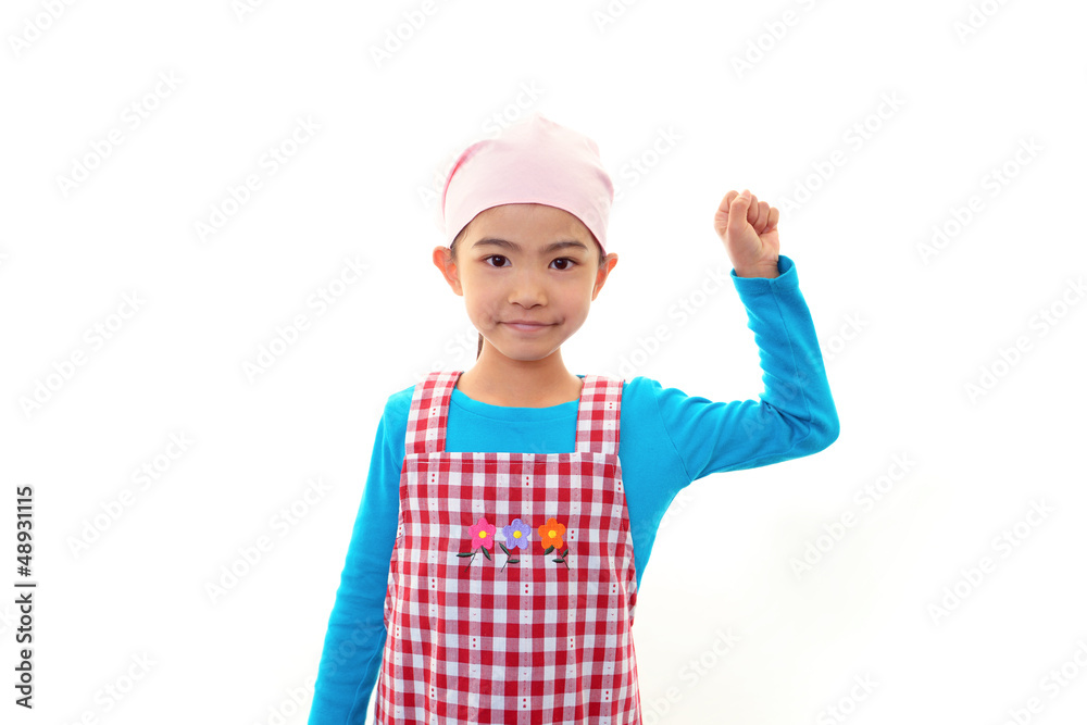 エプロンを着た笑顔の女の子 エプロンを着た笑顔の女の子