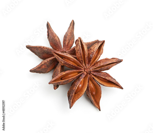 two whole star anise isolated on white background