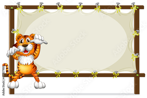 Fototapeta Naklejka Na Ścianę i Meble -  A tiger attempting to jump