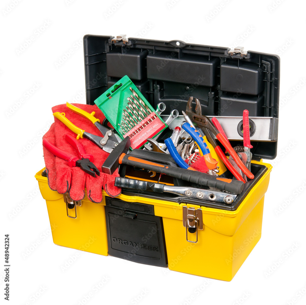 Yellow, a plastic box filled with tools. Isolated.