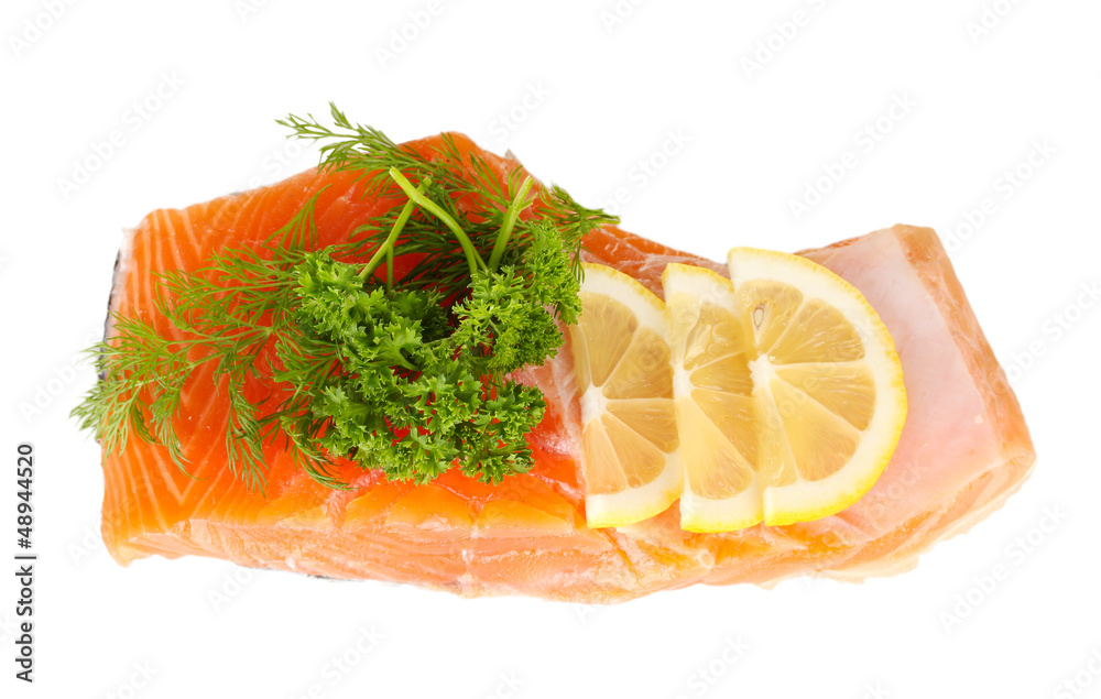 Fresh salmon fillet with herbals and lemon slices, isolated Fresh salmon fillet with herbals and lemon slices, isolated