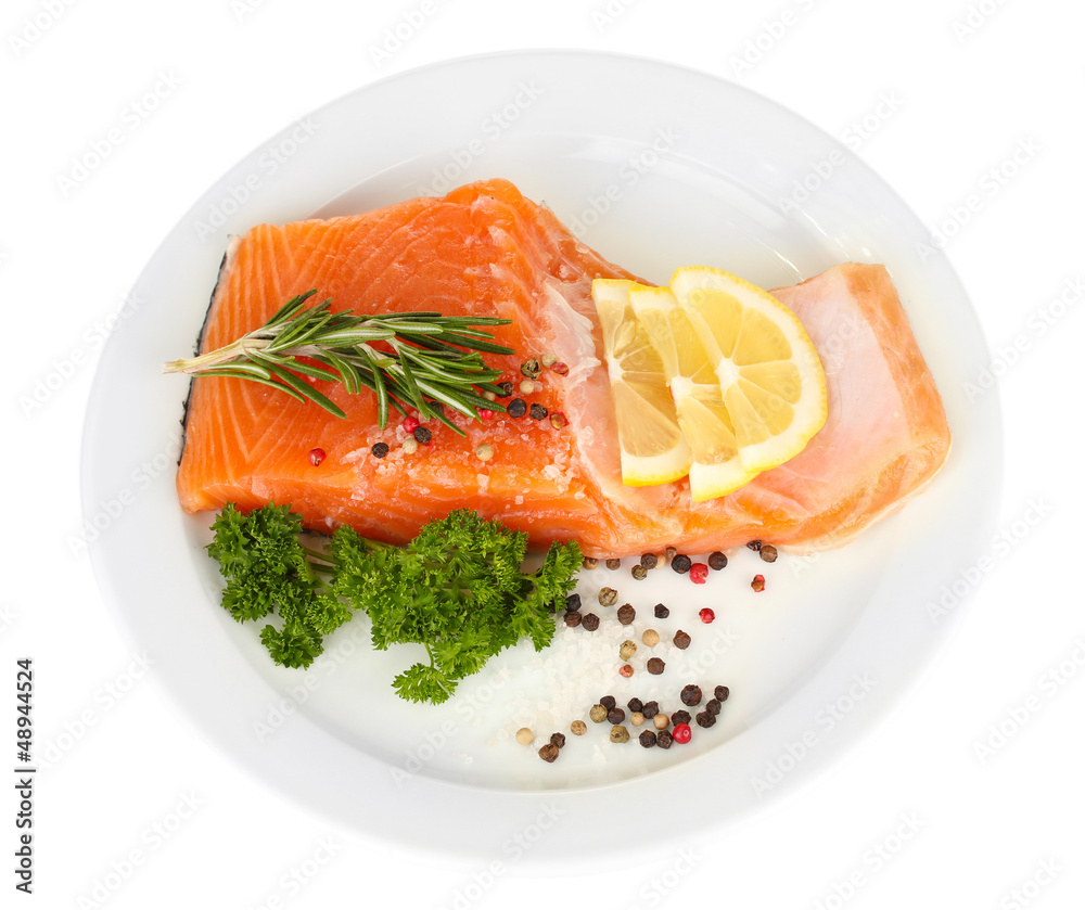 Fresh salmon fillet with herbals and lemon slices Fresh salmon fillet with herbals and lemon slices