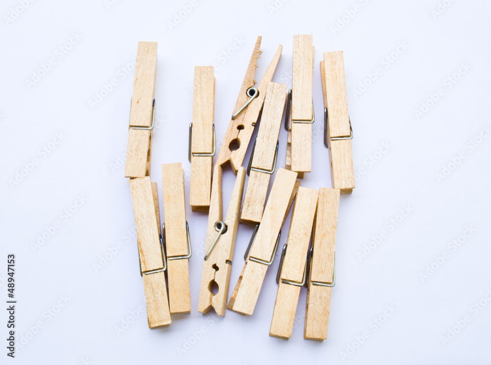 Wooden clothes clips isolated on white back ground Wooden clothes clips isolated on white back ground