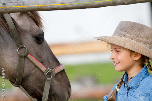 Ranch - girl with horse on the ranch, horse whisperer