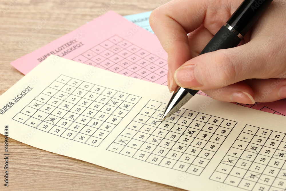 Fototapeta premium Closeup of lotto ticket during the marking of numbers,