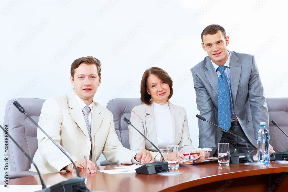 Fototapeta premium Three businesspeople at meeting