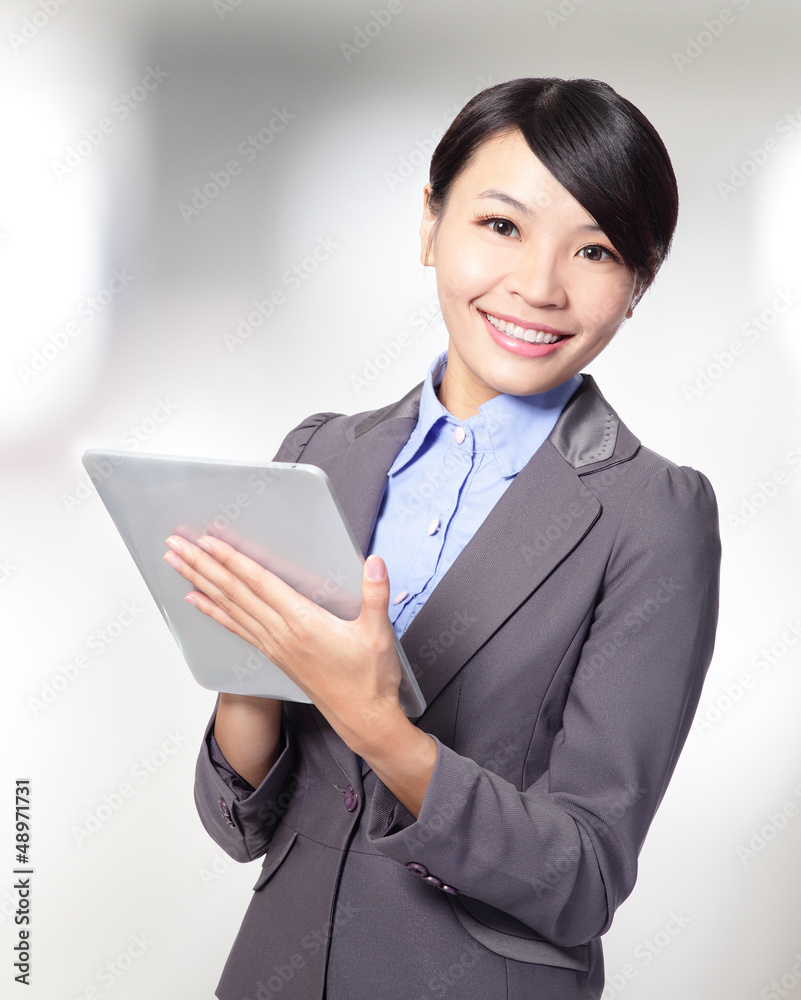 business woman holding a tablet pc business woman holding a tablet pc