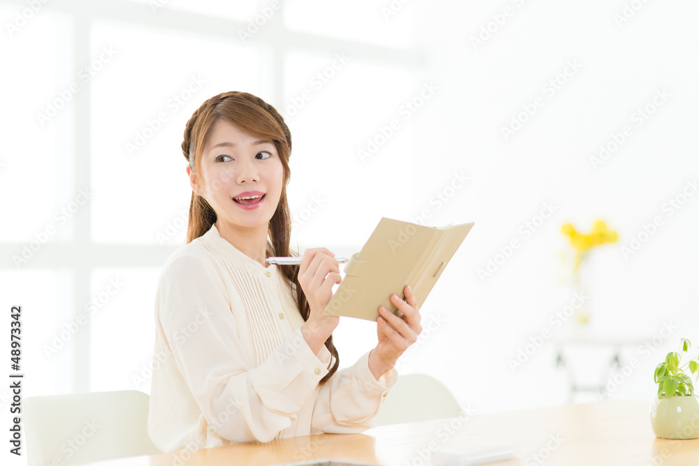 Beautiful asian woman relaxing in the room Beautiful asian woman relaxing in the room