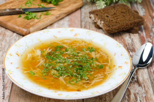 chicken soup with noodles and carrots