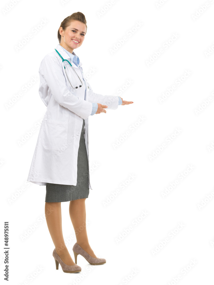 Full length portrait of medical doctor woman inviting to come Full length portrait of medical doctor woman inviting to come