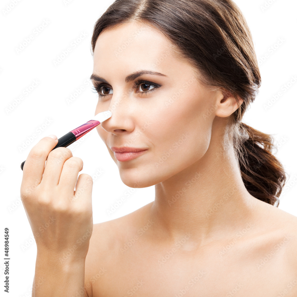 Smiling woman with make up brush, isolated Smiling woman with make up brush, isolated