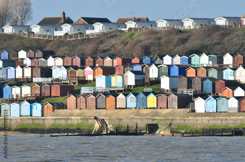 Beach hut and houses and Walton-on-Naze
