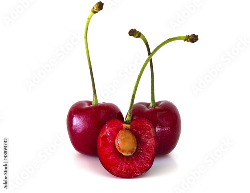 Sweet cherries isolated on white background with copy space.