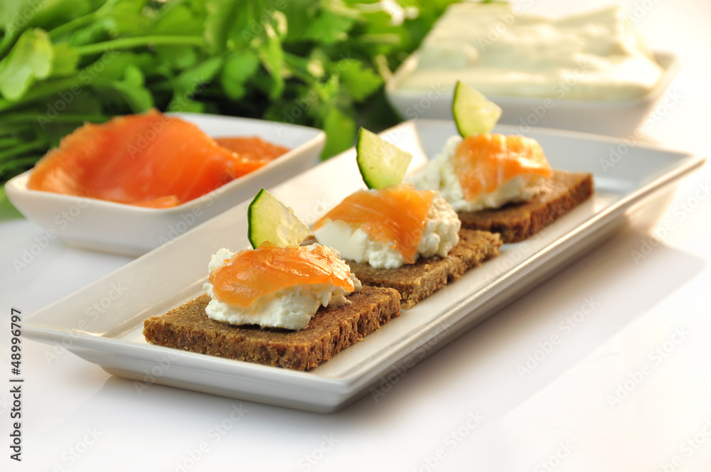 canapes rye bread with ricotta cheese and smoked salmon canapes rye bread with ricotta cheese and smoked salmon