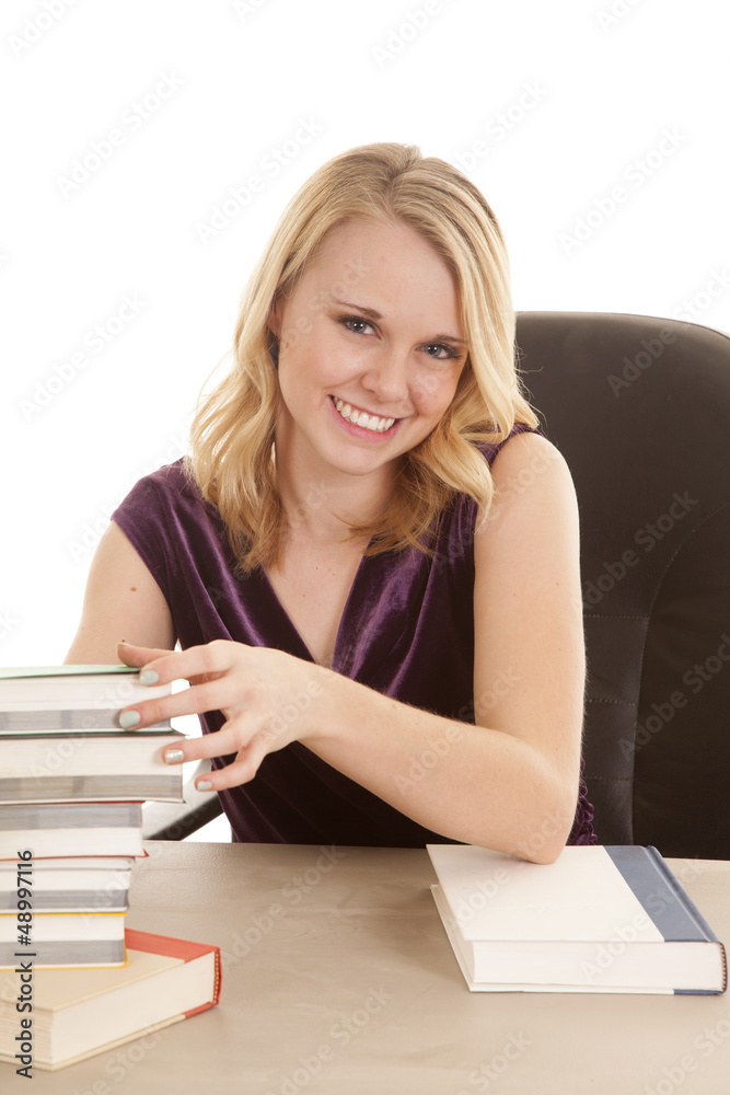 woman stack of books woman stack of books