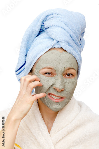 фотографія The clay facial mask treatment and beauty secrets