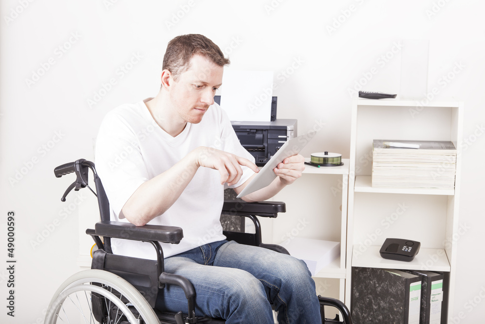 Man in wheelchair at work