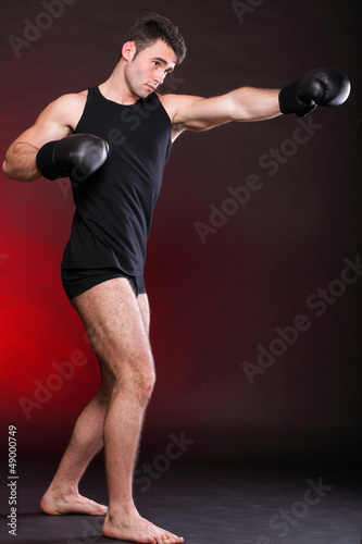 strong athletic muscle man sports guy showing his muscles