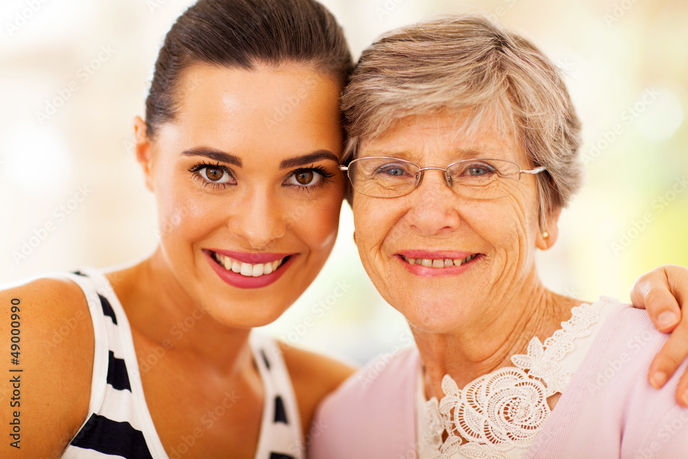 happy woman and senior mother closeup portrait happy woman and senior mother closeup portrait