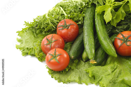 Stacked of Green cucumber with red tomato green lettuce