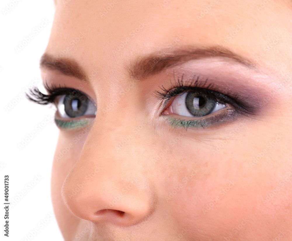 Fototapeta premium Beautiful female eyes with bright make-up, close up